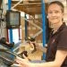 Tubex employee with barcode scanner in forklift truck